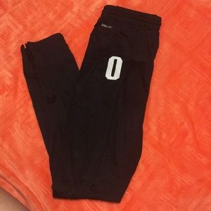 NIKE athletic pants with zippers